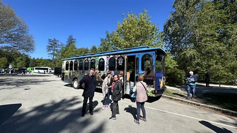 Exterior profile of a classic Great Canadian Trolley bus in Vancouver