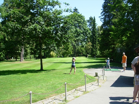 Golfers putting on the greens at the public pitch and putt golf facility