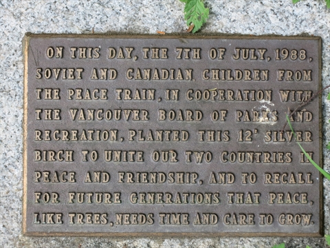 Peace Train Tree plaque in Stanley Park, Vancouver, BC, Canada