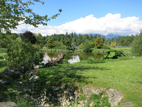Lush grass lawns and trees inside Devonian Harbour Park