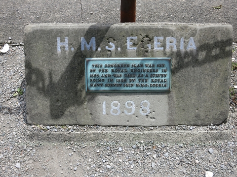 H.M.S. Egeria plaque context view on the concrete slab