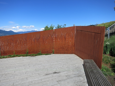 A dark textured steel historical monument commemorating the Komagata Maru incident