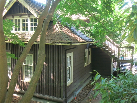 Side and back architectural view of the Rose Cottage in Stanley Park