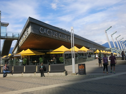 Exterior glass view of the Cactus Club Cafe restaurant at Jack Poole Plaza
