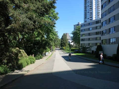 Lagoon Drive curving alongside the southwest properties of Stanley Park