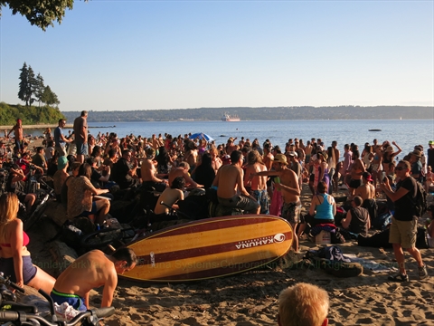 Gathering crowds establishing community guidelines at Third Beach