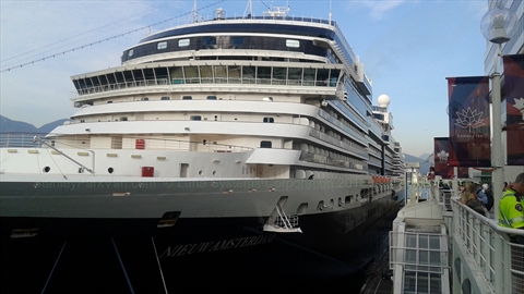 A major luxury cruise liner docked at the Canada Place cruise ship terminal pier