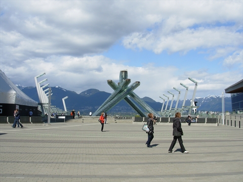 Wide brick pathways of Jack Poole Plaza during the day