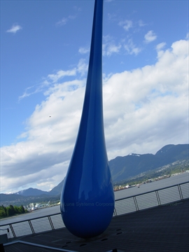The massive abstract blue drop sculpture outside the convention center