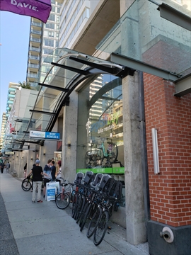 Exterior storefront awning of English Bay Bike Rentals on Davie Street
