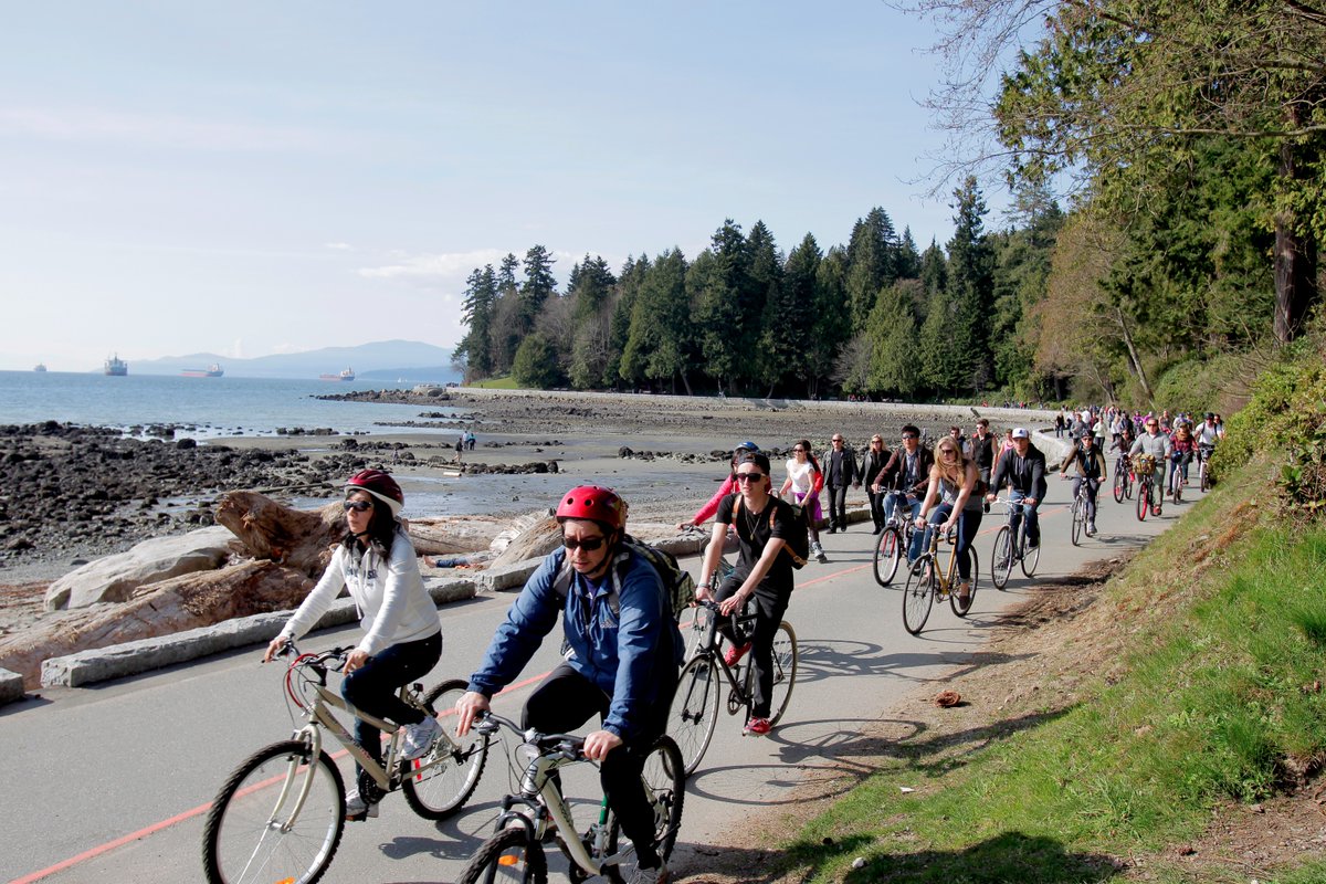 Cycling on Stanley Park Seawall in Stanley Park, Vancouver, BC, Canada