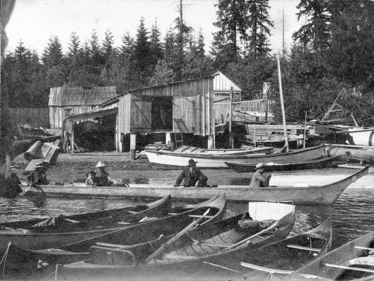 Houses and boats on Lost Lagoon in Stanley Park, Vancouver, BC, Canada