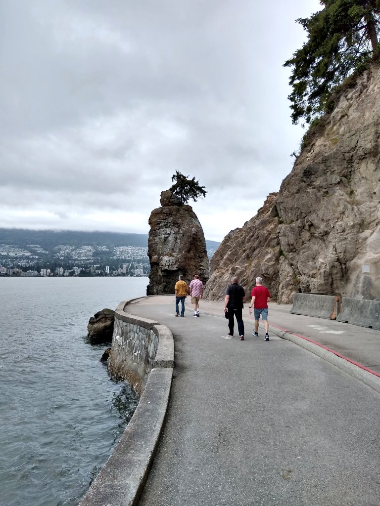 people walking on Stanley Park seawall, Vancouver, BC, Canada
